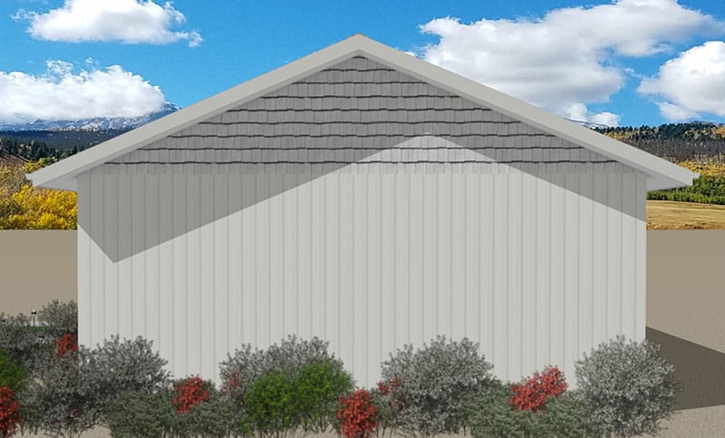Giro-Left-Elevation-02 A light gray metal building with a gable roof, surrounded by green and red shrubs, stands against a backdrop of fields, distant mountains, and a blue sky with scattered clouds.