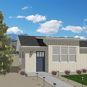 A small modern house with beige siding, a dark gray front door, and large windows. There is a concrete path with lights, some shrubs, a tree on the left, and mountains in the background under a partly cloudy sky.