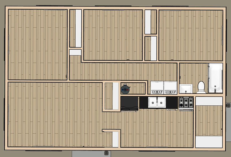 Juno-ADU-Dollhouse-01 A top-down view of a simple ADU floor plan showing multiple rooms with wooden flooring, a kitchen with appliances, a bathroom with a bathtub, sink, and toilet, and several small and large rooms.
