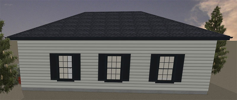 Juno-ADU-Rear-Elevation A simple, light-gray ADU with black trim, three windows in the front, and a dark shingled roof. Trees are visible on both sides in the background.